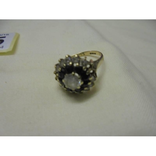 1015 - A 9ct gold 'Dad' ring size P and a 9ct gold stone set ring (missing two stones) size L, 4.6 grams.