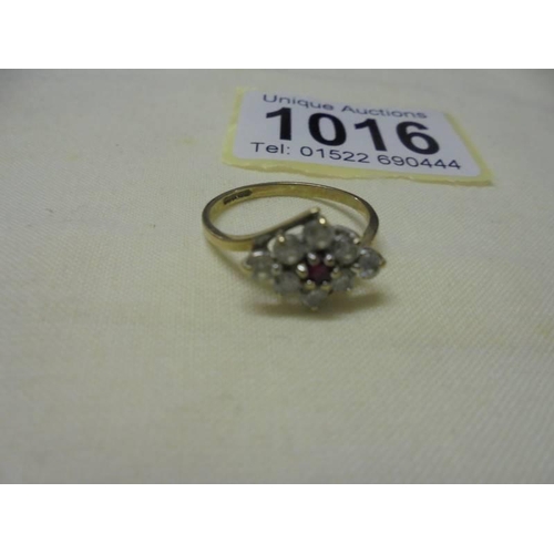 1016 - Two 9ct gold stone set rings, sized K and O, 5.4 grams.