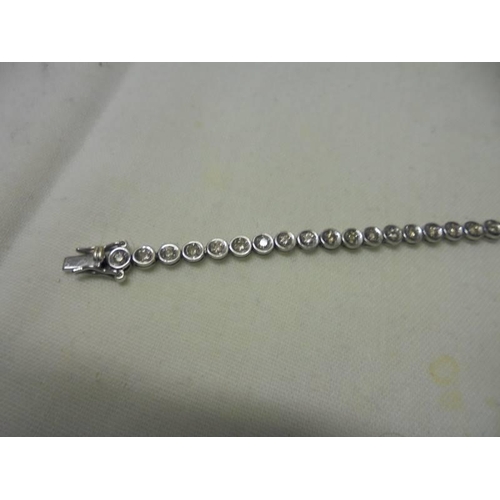1 - A 9ct yellow gold and diamond bracelet, 6.3 grams.