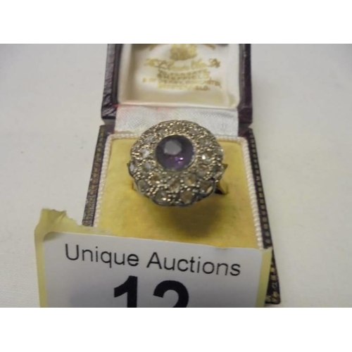 12 - An 18ct yellow gold sapphire and diamond ring, size Q, 6.1 grams.