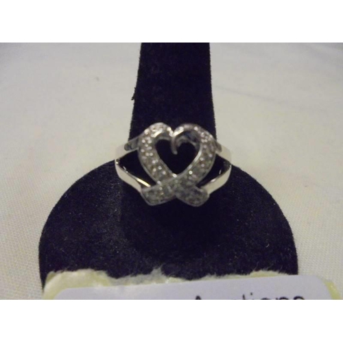 2 - An 18ct yellow gold heart shaped diamond ring, size M 5.6 grams.