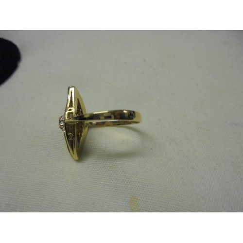 4 - An 18ct yellow gold diamond ring, size L, 4 grams.