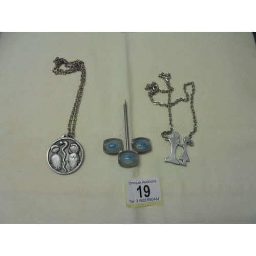 19 - Three Jorgen Jensen pewter jewellery items.
