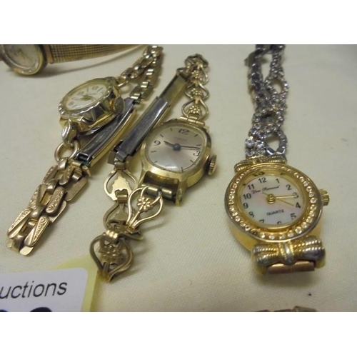 1038 - A mixed lot of ladies wristwatches including Gucci, Cocktail watches etc.,