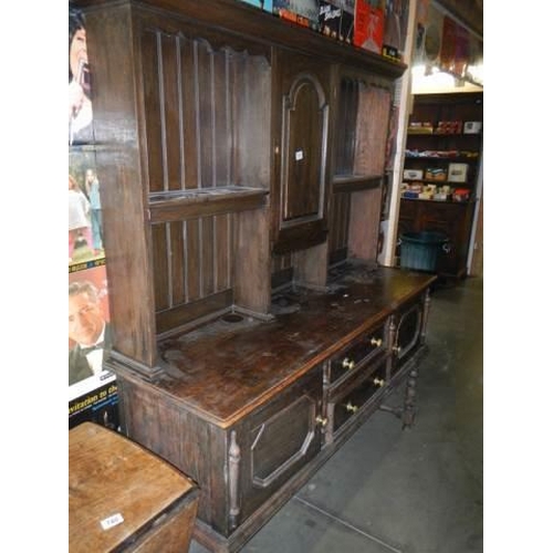 737 - An early 20th century oak dresser, COLLECT ONLY.