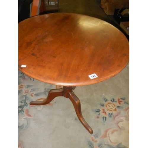 745 - A Victorian mahogany circular tip top table, COLLECT ONLY.