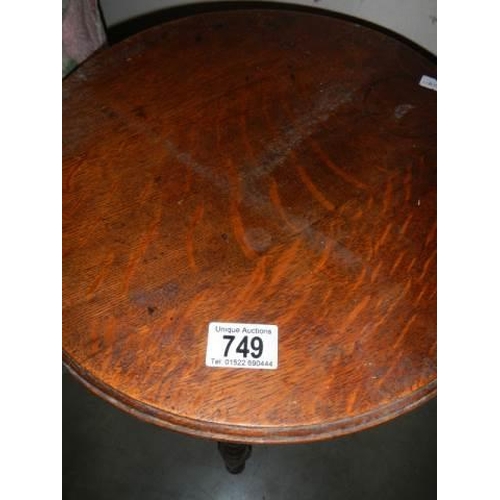 749 - A small circular table on bobbin twist supports, COLLECT ONLY.