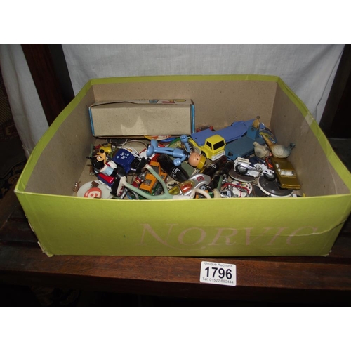 1796 - Contents of a toy box including nostalgia badges, Dinky, Matchbox diecast, Coca Cola memorabilia etc