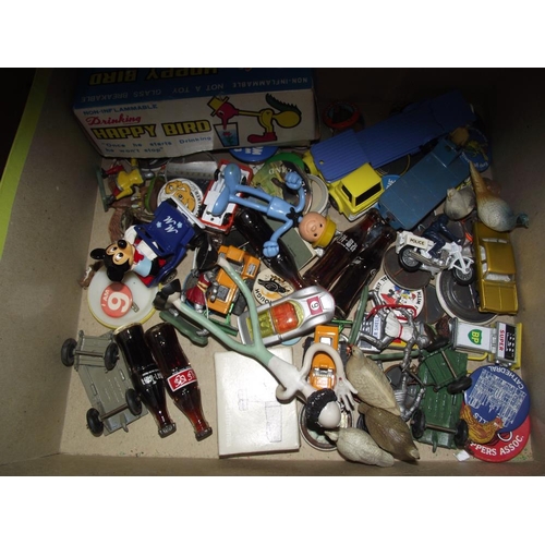 1796 - Contents of a toy box including nostalgia badges, Dinky, Matchbox diecast, Coca Cola memorabilia etc