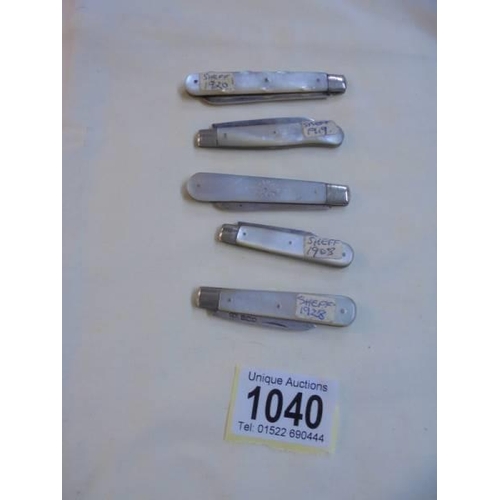 1040 - Five silver and mother of pearl fruit knives - 1908, 1919, 1920, 1928 etc.,