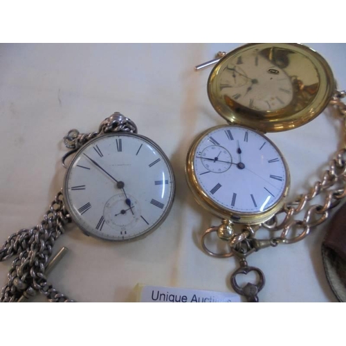 1043 - A yellow metal full hunter pocket watch on yellow metal chain and a white metal pocket watch on chai... 