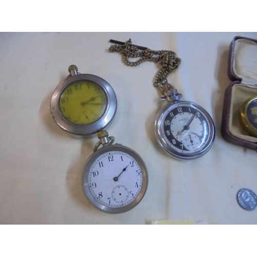 1044 - Three old pocket watches a/f, one on brass chain and a dried flower in case.