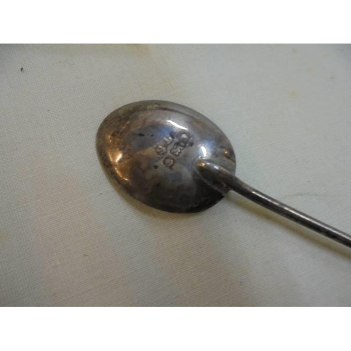 1045 - Six silver coffee bean spoons, a silver handled sugar spoon and an unmarked spoon.