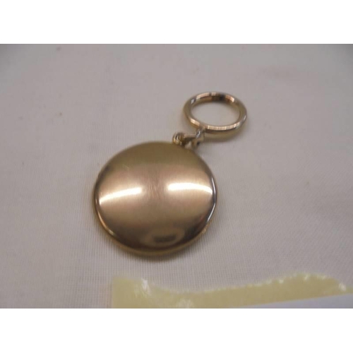 1062 - A 10 carat gold early 20th century locket in rose gold, stamped 10ct. 5.3 grams.