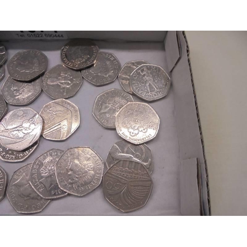 1071 - A collection of 30 fifty pence coins including Beatrix Potter, Paddington Bear etc.,