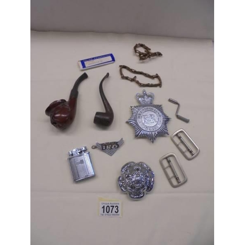 1073 - Two old pipes, metal police badges etc.,