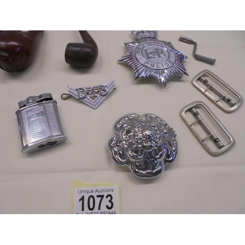 1073 - Two old pipes, metal police badges etc.,