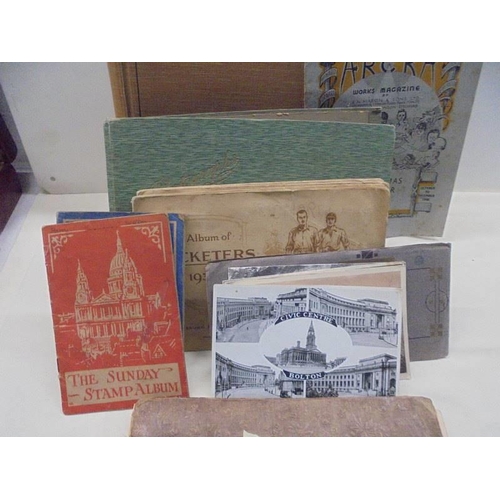 1088 - An old postcard album, and old photograph album and other albums.