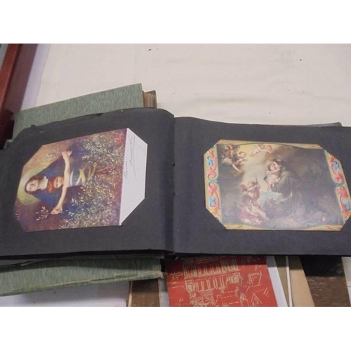 1088 - An old postcard album, and old photograph album and other albums.