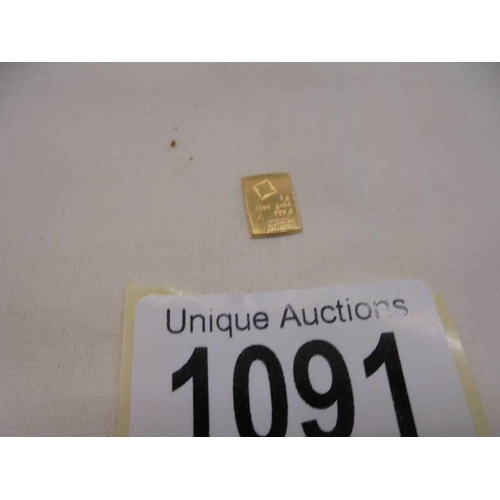 1091 - A one gram ingot of fine gold (9.999).