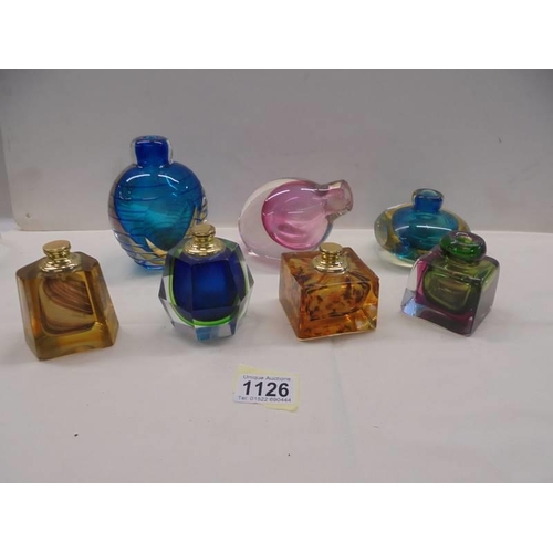 1126 - Seven items of Studio glass including inkwells and scent bottles.