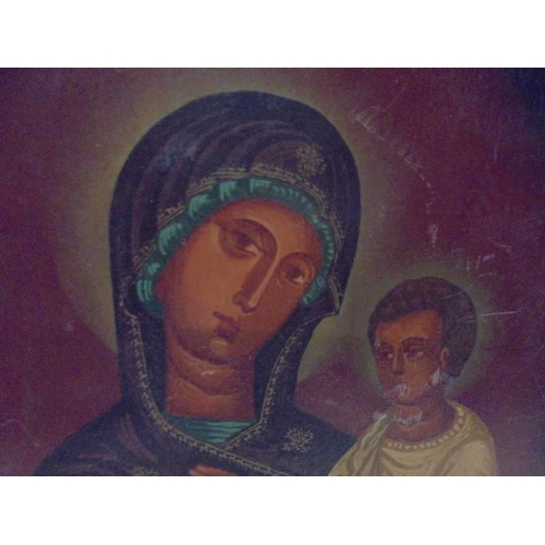 1140 - A religious painting of Madonna and child on wood.