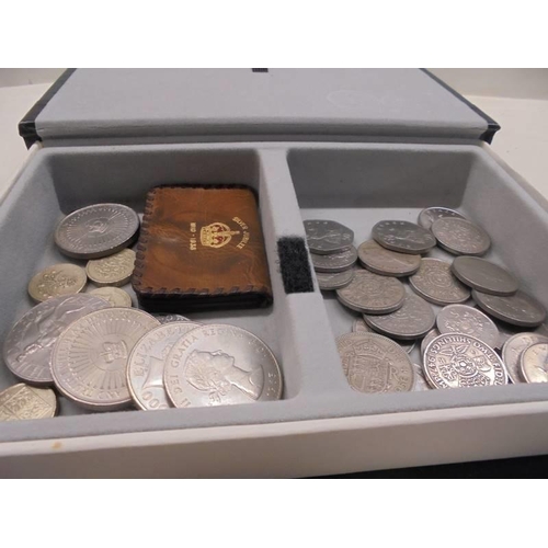 1144 - A box of assorted coins including Churchill crowns.