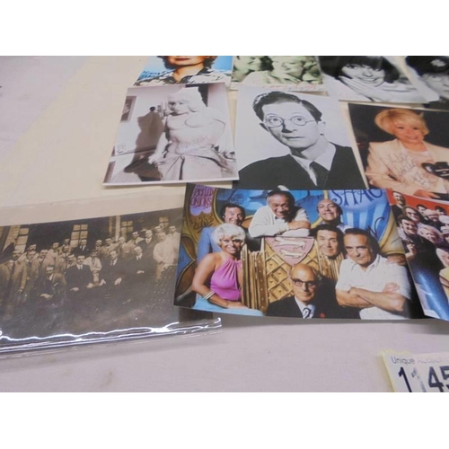 1145 - A quantity of photographs of mainly 'Carry on Stars' some with autographs.