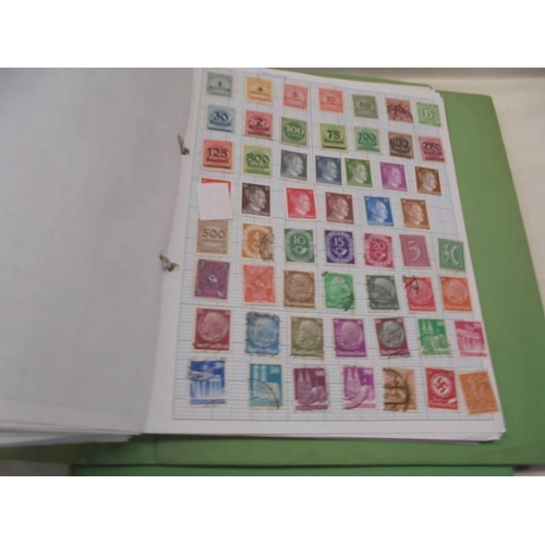 1147 - Three folders of UK and world stamps.