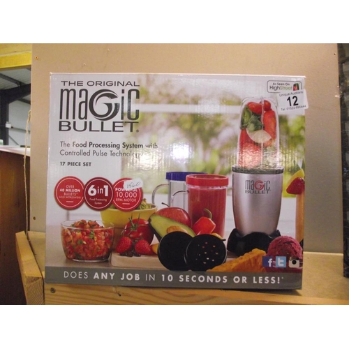 12 - A boxed original Magic Bullet food processing system