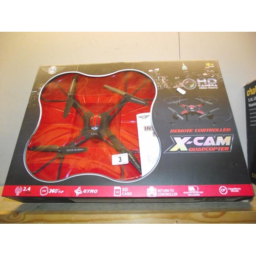 3 - A boxed remote controlled X-cam quadcopter (missing battery)