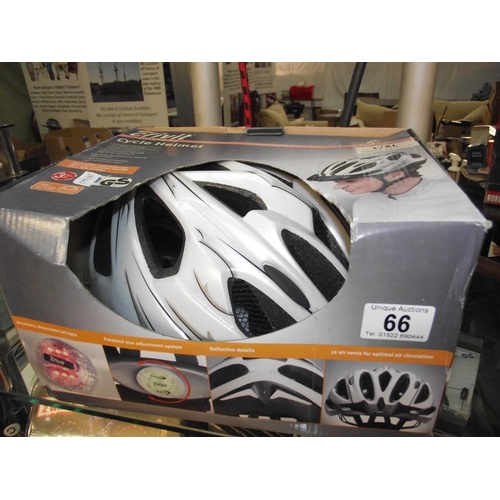 66 - A Crivit cycle helmet L/Xl 59cm to 65cm and 2 bicycle floor pumps