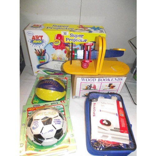 32 - A boxed Art Attack super projector, Pro-shot football and basketball, bookends and a table tennis se... 