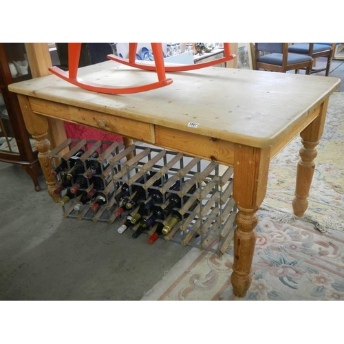 1507 - A pine scrub top table with one drawer. COLLECT ONLY.