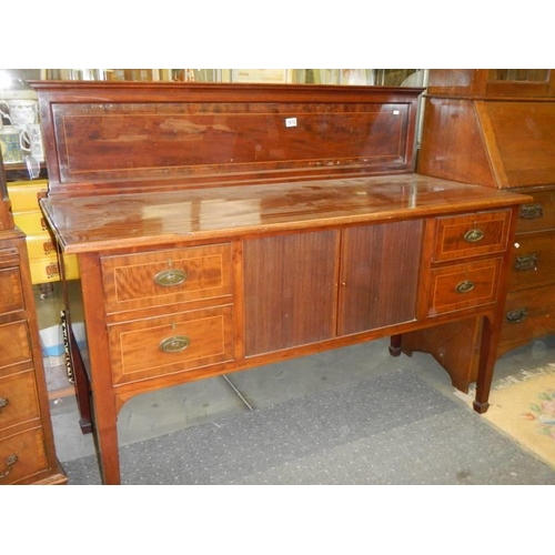 1510 - A mahogany sideboard with sliding doors, COLLECT ONLY.