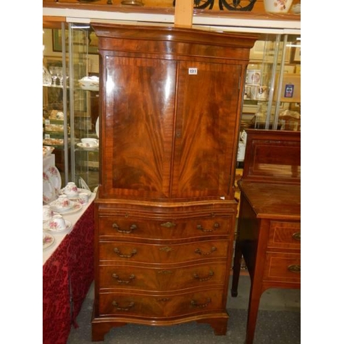 1511 - A Two door mahogany cocktail cabinet with four drawer base. COLLECT ONLY.