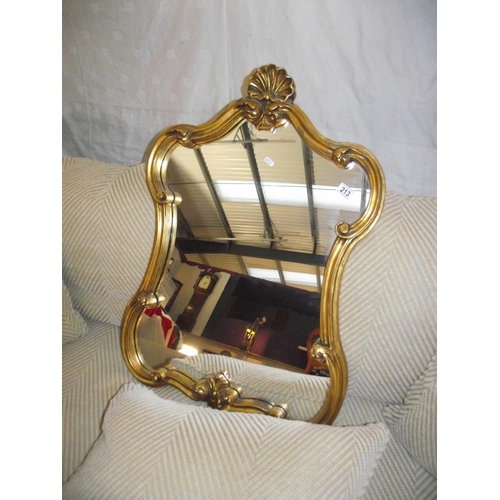 213 - An ornate gilt framed mirror COLLECT ONLY