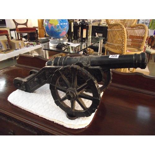 224 - A large cast iron cannon,  barrel length 50cm COLLECT ONLY