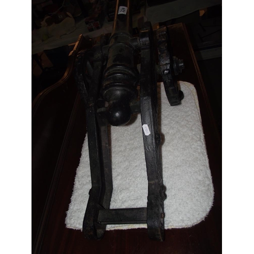 224 - A large cast iron cannon,  barrel length 50cm COLLECT ONLY