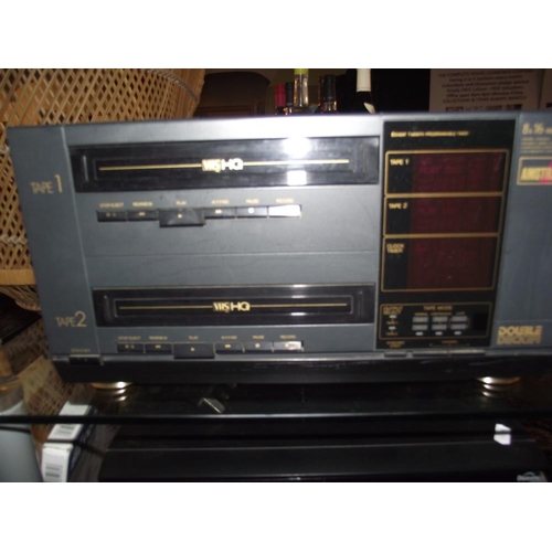 255 - A Garrard record deck (lid a/f), Amstrad double decker VHS player, teleton stereo amplifier SAQ 307 ... 