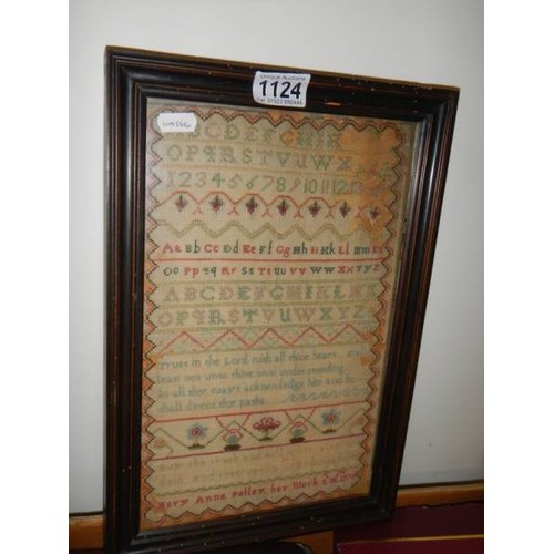 1124 - A framed and glazed Georgian sampler dated 1779 by Mary Ann Pulleg her work, COLLECT ONLY.