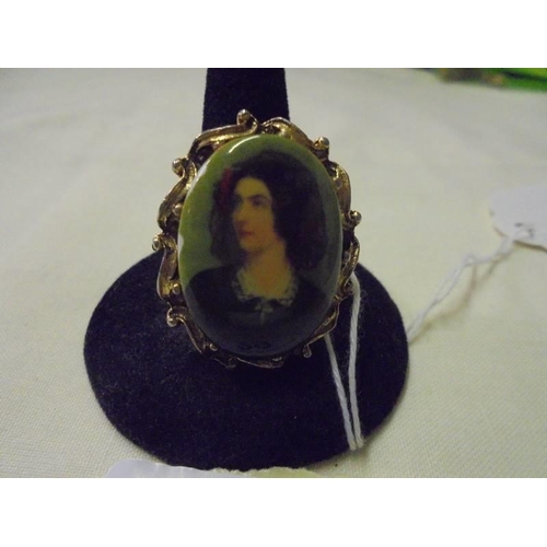 29 - A porcelain portrait brooch in a gilt metal mount.