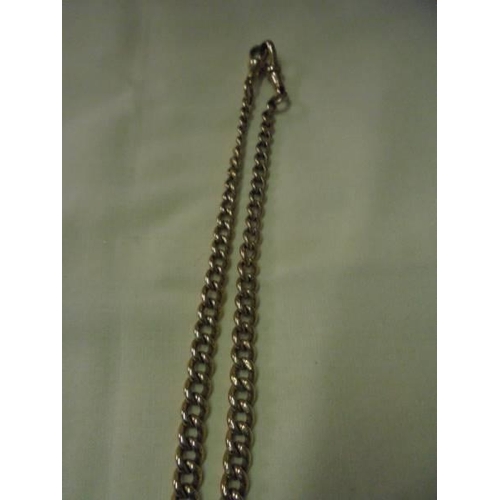 43 - A 9ct carat Watch Albert chain with attached fob, 38.6 grams.