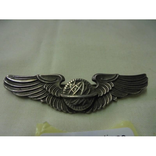 44 - A silver 'Wings' brooch.