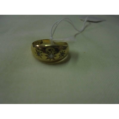 48 - An 18ct gold ring set diamonds, size K half, 2.8 grams.