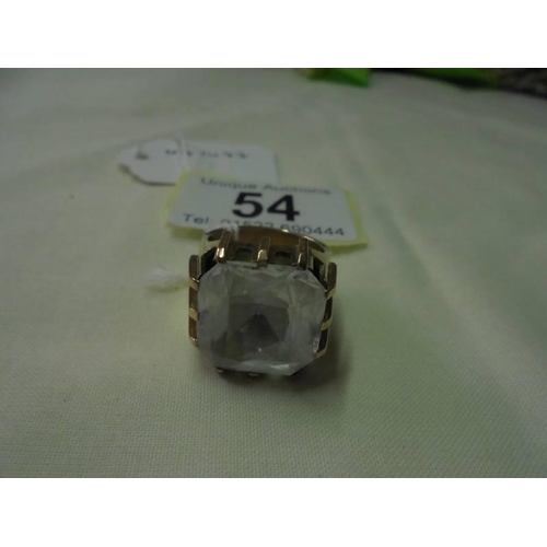 54 - A large 9ct gold ring set clear stone, size M, 14.4 grams.