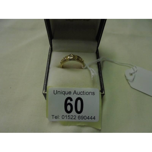 60 - An 18ct gold MIZPAH ring, size N half, 3.9 grams.