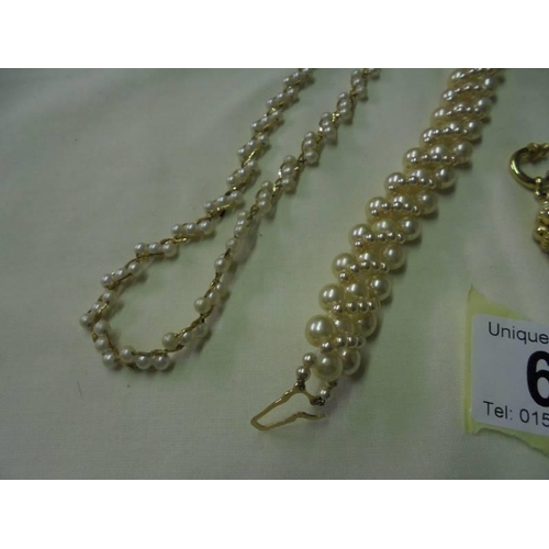 62 - A pearl necklace, bracelet and earrings.