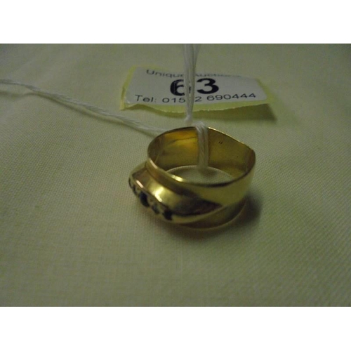 63 - An un-marked blended stone set ring, size J, 5.9 grams.