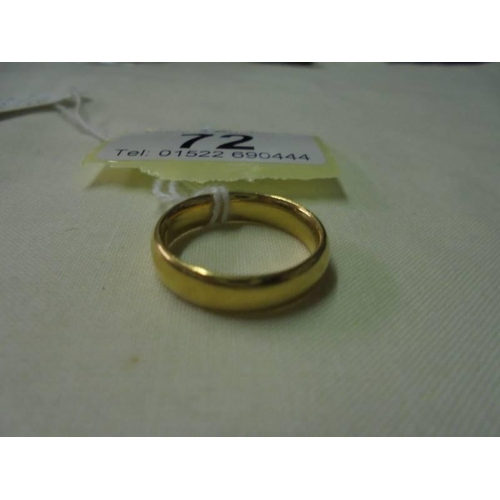 72 - A 22ct gold wedding band, size L, 6.5 grams.